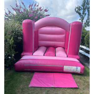 Shades of pink bouncy castle hire