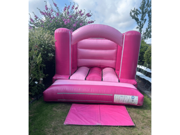 Shades of pink bouncy castle hire