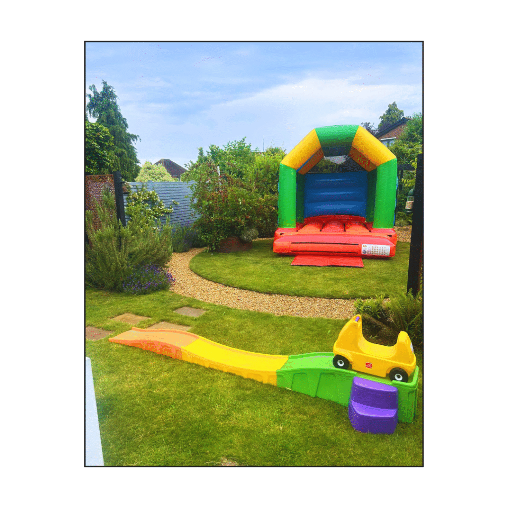 Rainbow Bouncy Castle and Multicoloured Roller Coaster