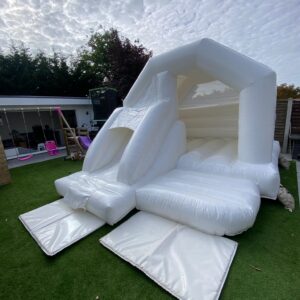 White front slide bouncy castle hire