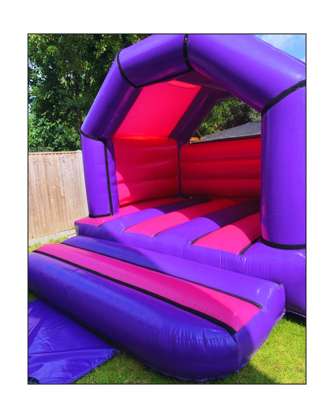 Medium Bouncy Castle Hire Pink and purple bouncy castle hire