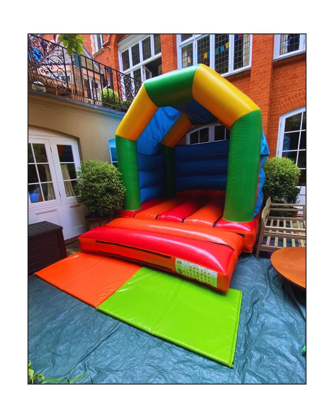 Rainbow bouncy castle hire